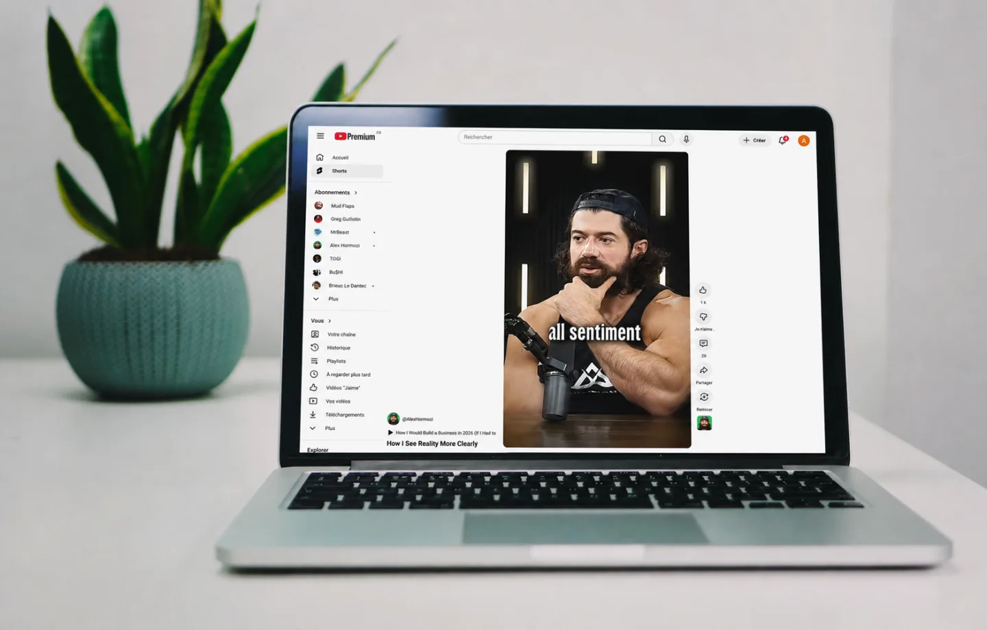 A laptop screen showing the YouTube Shorts viewer in a desktop browser — the surface Nope's Chrome extension removes.